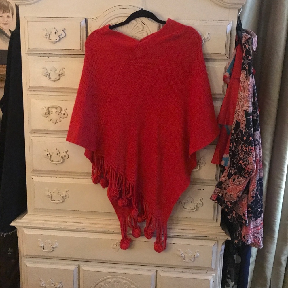 Red sweater poncho